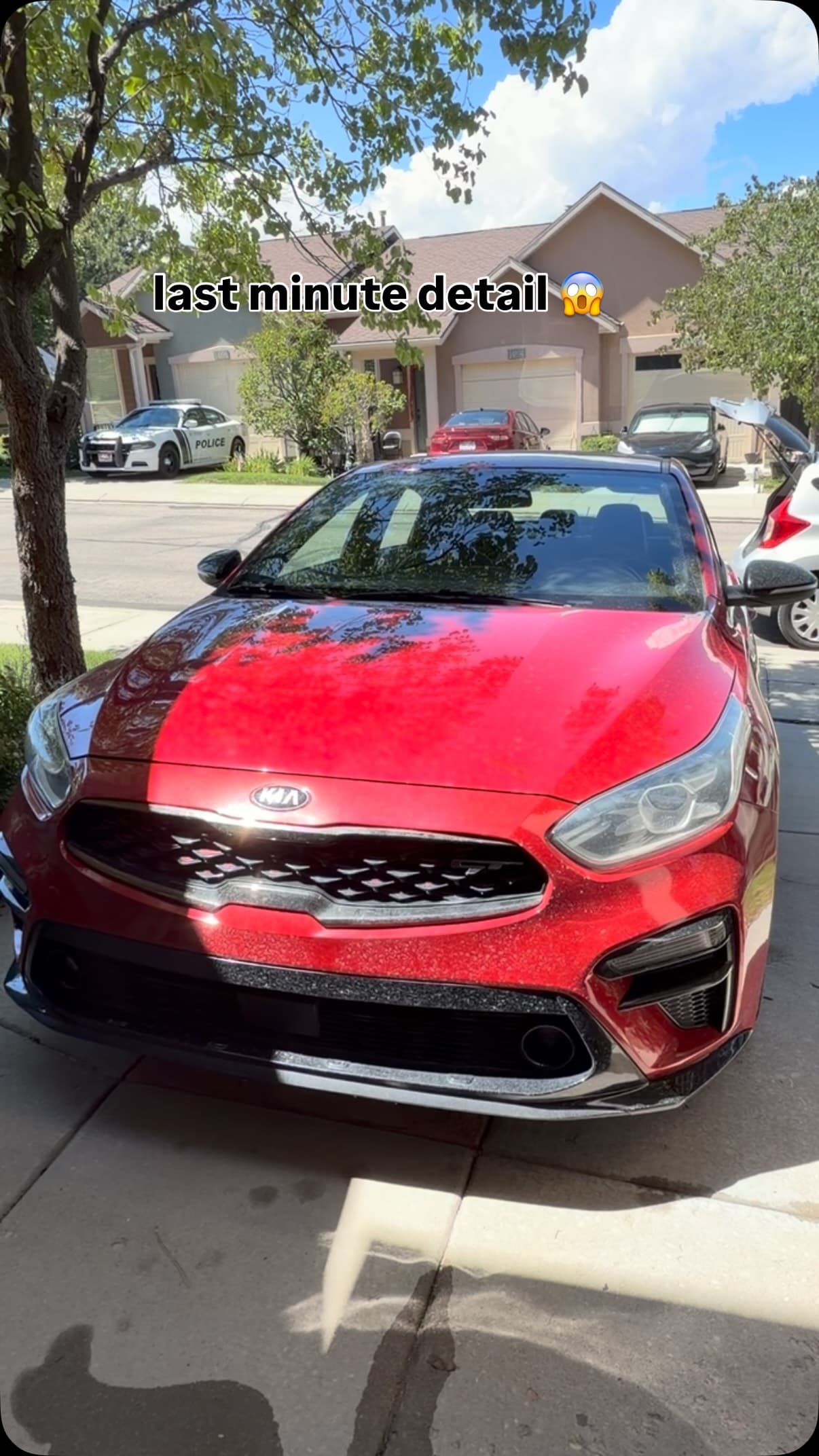 Red Kia at a residential driveway after a paid Jordan Valley Detail customer appointment