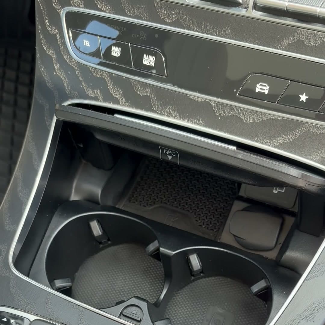 The same Mercedes center console clean after detailing
